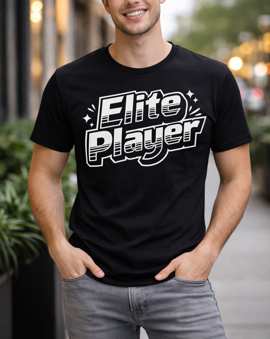Man wearing a black t-shirt with 'Elite Player' text in an urban setting