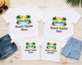 Four white t-shirts with 'Beach Squad' text and graphics on a wooden surface with shorts and beach accessories.