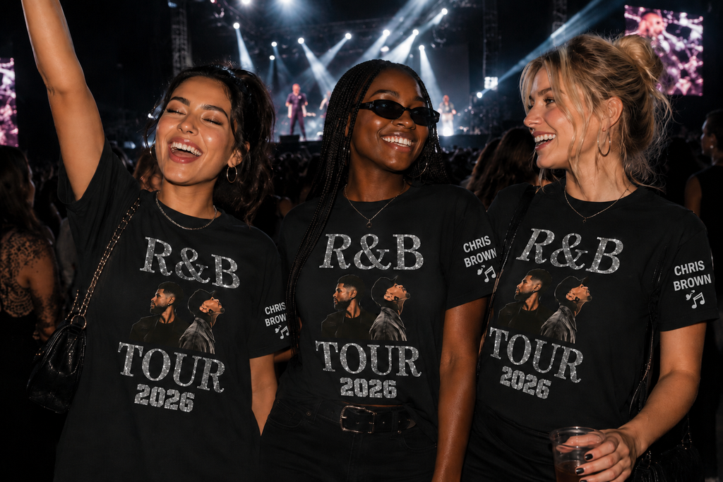 Three people wearing 'R&B Tour 2026' t-shirts at a concert.