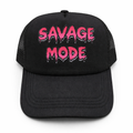 Black trucker cap with 'SAVAGE MODE' in pink text on a white background