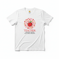 White t-shirt with a red apple and heart design, featuring the text 'Teacher: Shaping Minds. Touching Hearts.